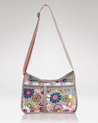 Workday to weekend, LeSportsac's carry-everything nylon crossbody is the very definition of effortless. Workday to weekend, LeSportsac's carry-everything nylon crossbody is the very definition of effortless.