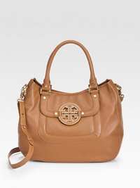 Soft and slouchy leather makes up this roomy carryall, adorned with iconic logo hardware.Double top handles, 7 drop Adjustable shoulder strap, 7-23 drop Magnetic snap closure One outside flap pocket Protective metal feet One inside zip pocket Two inside open pockets Cotton lining 14W X 11H X 4½D Imported Soft and slouchy leather makes up this roomy carryall, adorned with iconic logo hardware.Double top handles, 7 drop Adjustable shoulder strap, 7-23 drop Magnetic snap closure One outside flap pocket Protective metal feet One inside zip pocket Two inside open pockets Cotton lining 14W X 11H X 4½D Imported