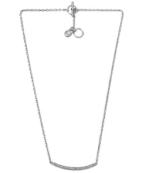 Raise the bar. Michael Kors unique pendant necklace combines a sculptured curved bar, set in silver tone mixed metal and accented by pave-set crystals. Toggle clasp features MK logo charm. Approximate length: 16 inches. Raise the bar. Michael Kors unique pendant necklace combines a sculptured curved bar, set in silver tone mixed metal and accented by pave-set crystals. Toggle clasp features MK logo charm. Approximate length: 16 inches.