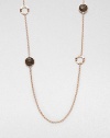 From the Lite Links Collection. A long and elegant style featuring faceted smokey quartz stones and open circles in a station design in sterling silver and 18k gold, finished in the warm glow of 18k rose goldplating. Smokey quartzSterling silver and 18k gold with 18k rose goldplatingLength, about 37Lobster clasp closureImported 