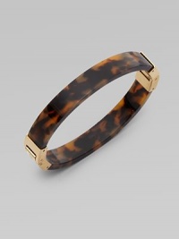 Glossy tortoise print resin design with goldtone accents and hinge closure. ResinGoldtoneDiameter, about 2¾Hinged closureImported Glossy tortoise print resin design with goldtone accents and hinge closure. ResinGoldtoneDiameter, about 2¾Hinged closureImported