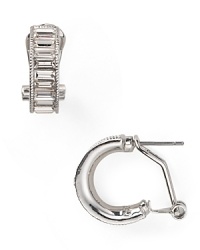Timeless baguette-centered plaques drip from post backs on this pair of Carolee hoop earrings, crafted of plated metal. Timeless baguette-centered plaques drip from post backs on this pair of Carolee hoop earrings, crafted of plated metal.