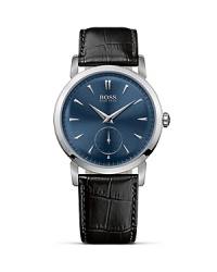 Featuring an ultra slim movement and case, a curved blue dial and an embossed crocodile black leather strap, this timepiece is elegant on the wrist. Featuring an ultra slim movement and case, a curved blue dial and an embossed crocodile black leather strap, this timepiece is elegant on the wrist.