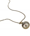 Get from A to B in a breeze. Fossil's vintage-inspired compass pendant features a chic long chain. Crafted in brass and silver tone mixed metal. Approximate length: 28 inches + 2-inch extender. Approximate drop: 1-1/2 inches.