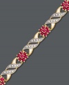 Fluid floral design adds an element of beauty to your look. Victoria Townsend bracelet features round-cut rubies (1-1/5 ct. t.w.) and rows of sparkling diamond accents in a 18k gold over sterling silver swirl setting. Approximate length: 7 inches.
