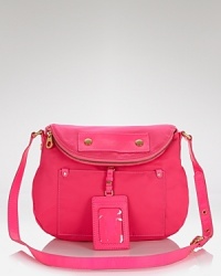 MARC BY MARC JACOBS perfects playful, preppy style with this nylon crossbody bag. MARC BY MARC JACOBS perfects playful, preppy style with this nylon crossbody bag.