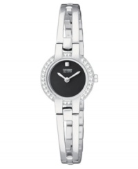 Crystals line the silhouette of this feminine Eco-Drive watch by Citizen. Crystals line the silhouette of this feminine Eco-Drive watch by Citizen.