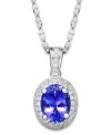 Add a colorful touch of shine. This pretty & polished pendant highlights an oval-cut tanzanite (1-1/2 ct. t.w.) that stands out against a backdrop of round-cut diamonds (1/5 ct. t.w.). Set in 14k white gold. Approximate length: 18 inches. Approximate drop: 13/20 inch.