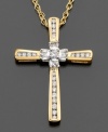 Intricately adorned in diamonds and gold, this cross pendant is sure to be cherished. Features round- and baguette-cut diamond (1/4 ct. t.w.) in 14k gold setting. Approximate length: 18 inches. Approximate drop: 1 inch.