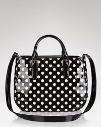 Endlessly versatile, this kate spade new york satchel hits the dot, crafted of glossy patent leather with a double function design. Endlessly versatile, this kate spade new york satchel hits the dot, crafted of glossy patent leather with a double function design.