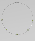 From the Silver Rain Collection. Delicate diamonds and faceted peridot are equally radiant within settings of hammered sterling silver on a graceful chain.Diamonds, .20 tcw Peridot Sterling silver Length, about 18 Lobster clasp Imported
