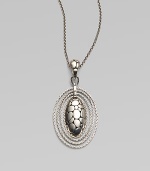 From the Kali Zen Collection. A graceful yet striking oval - with the Kali stepping-stone texture on the front, an open filigree back and rope chain edging - hangs from a sterling silver woven chain. Sterling silver Chain length, about 36 Pendant length, about 2½ Pendant width, about 1¼ Lobster clasp Made in Bali