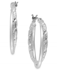 Twists and turns add suspenseful appeal to these earrings from Charter Club. The classic hoop has been embellished with crystal shimmer. Crafted in silver tone mixed metal. Approximate drop: 9/10 inch. Twists and turns add suspenseful appeal to these earrings from Charter Club. The classic hoop has been embellished with crystal shimmer. Crafted in silver tone mixed metal. Approximate drop: 9/10 inch.