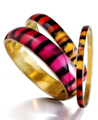 Show your true stripes. Bright fuchsia, red, and orange hand-painted hues make a bold statement on Style&co.'s resin and brass three piece bangle set. Approximate diameter: 2-5/8 inches. Show your true stripes. Bright fuchsia, red, and orange hand-painted hues make a bold statement on Style&co.'s resin and brass three piece bangle set. Approximate diameter: 2-5/8 inches.