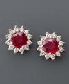 Style with a regal flair. These head-turning earrings from Royalty Inspired by Effy Collection feature bright red rubies (2 ct. t.w.) surrounded by a halo of sparkling round-cut diamonds (5/8 ct. t.w.). Set in 14k rose gold. Approximate diameter: 1/2 inch.