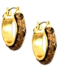 Sultry in serpent. Anne Klein's hoop earrings boast added bite with snakeskin leather. Crafted in gold tone mixed metal. Approximate diameter: 1 inch. Sultry in serpent. Anne Klein's hoop earrings boast added bite with snakeskin leather. Crafted in gold tone mixed metal. Approximate diameter: 1 inch.