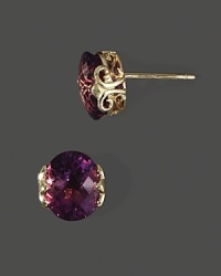 Brilliant faceted amethysts in intricate 14K yellow gold settings. Brilliant faceted amethysts in intricate 14K yellow gold settings.