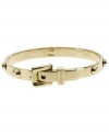 Buckle up for fast fashion. This golden Michael Kors bracelet features an adjustable design for a versatile look. Crafted from gold tone steel. Approximate width: 2-1/2 inches.