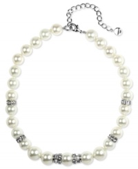 It's all about presentation, and this Givenchy necklace will turn heads. Crafted in silver tone mixed metal, necklace features a sweet strand of polished glass pearls (10 mm and 18 mm) accented by sparkling crystals. Approximate length: 16 inches. It's all about presentation, and this Givenchy necklace will turn heads. Crafted in silver tone mixed metal, necklace features a sweet strand of polished glass pearls (10 mm and 18 mm) accented by sparkling crystals. Approximate length: 16 inches.