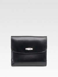 A polished flap-front wallet made of sumptuously-soft leather, finished with sleek back snaps. Snap flap closureThree credit card slotsFully lined4½W X 3¾H X ½DMade in France A polished flap-front wallet made of sumptuously-soft leather, finished with sleek back snaps. Snap flap closureThree credit card slotsFully lined4½W X 3¾H X ½DMade in France