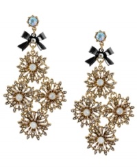 For a glamourous vintage-inspired appeal, reach no further than these gorgeous chandelier earrings from Betsey Johnson. Gold-plated flowers with crystal accents will add just enough sparkle to your look, while hematite-plated bows and a crystal accented post add the perfect finishing touches. Approximate drop: 3-1/3 inch. For a glamourous vintage-inspired appeal, reach no further than these gorgeous chandelier earrings from Betsey Johnson. Gold-plated flowers with crystal accents will add just enough sparkle to your look, while hematite-plated bows and a crystal accented post add the perfect finishing touches. Approximate drop: 3-1/3 inch.