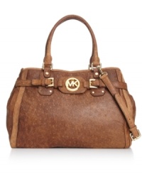 Add a little laid-back luxe to your accessories arsenal with this luscious lovely from MICHAEL Michal Kors. Antiqued leather is bedecked with gleaming hardware and signature detailing, while a plethora or pockets offers superb organization within. Add a little laid-back luxe to your accessories arsenal with this luscious lovely from MICHAEL Michal Kors. Antiqued leather is bedecked with gleaming hardware and signature detailing, while a plethora or pockets offers superb organization within.