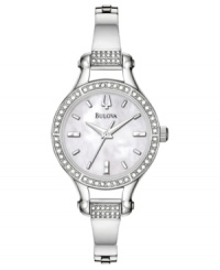 A beautiful, retro-inspired watch with everlasting glamor. Silvertone stainless steel bangle bracelet and round case with crystal accents. Round mother-of-pearl dial with logo and stick indices. Quartz movement. Water resistant to 30 meters. Three-year limited warranty. A beautiful, retro-inspired watch with everlasting glamor. Silvertone stainless steel bangle bracelet and round case with crystal accents. Round mother-of-pearl dial with logo and stick indices. Quartz movement. Water resistant to 30 meters. Three-year limited warranty.