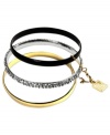 Stack on the perfect trio of bangles, by Anne Klein. This set of 3 bracelets features chain-connected gold tone, jet tone, and silver tone designs. Silver style embellished with glass stone accents. Crafted in gold tone mixed metal. Approximate diameter: 2-1/2 inches.