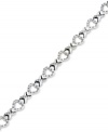 An excellent selection. This X link bracelet is crafted from platinum over sterling silver with diamond accents giving it a lustrous touch. Approximate length: 7-1/2 inches. Approximate width: 3/8 inch.