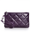 Take a shine to everyday accessorizing with this glossy goodie from Style&co. Featuring a quilted pattern and convenient wristlet strap, you can slip it in your handbag or wear it on its own almost anywhere.