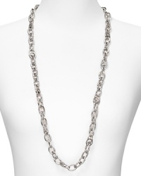 MICHAEL Michael Kors' logo-embossed chain adds a stroke of silver polish to daytime looks. Layer the showpiece over everything from graphic prints to cozy cashmere. MICHAEL Michael Kors' logo-embossed chain adds a stroke of silver polish to daytime looks. Layer the showpiece over everything from graphic prints to cozy cashmere.