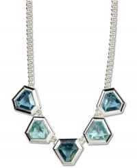 Drape your neck in cool blues. Pretty blue topaz glass accents bring an alluring look to this frontal necklace from Anne Klein. Set in silver tone mixed metal. Approximate length: 17-inches + 2-inch extender. Approximate drop: 3 inches Drape your neck in cool blues. Pretty blue topaz glass accents bring an alluring look to this frontal necklace from Anne Klein. Set in silver tone mixed metal. Approximate length: 17-inches + 2-inch extender. Approximate drop: 3 inches