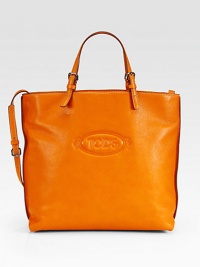 Roomy design with the iconic logo, crafted in luxe leather for on-the-go style. Adjustable top handles, 3¾-9½ dropAdjustable shoulder strap, 17-20 dropMagnetic snap closureOne inside zip pocketFully lined14½W X 13H X 5DMade in Italy Roomy design with the iconic logo, crafted in luxe leather for on-the-go style. Adjustable top handles, 3¾-9½ dropAdjustable shoulder strap, 17-20 dropMagnetic snap closureOne inside zip pocketFully lined14½W X 13H X 5DMade in Italy