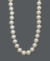 Timeless elegance and a gift to last a lifetime. This sophisticated strand of cultured freshwater pearls (9-10 mm) is set in 14k gold. Approximate length: 18 inches.