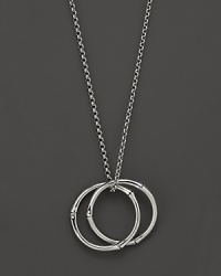 A classic interlinking design lends a timeless look to John Hardy's Bamboo link pendant necklace. A classic interlinking design lends a timeless look to John Hardy's Bamboo link pendant necklace.
