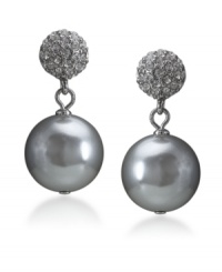 Chic sophistication in silver hues. These magical earrings by Carolee feature a crystal coated stud and a large charcoal-colored glass pearl drop (14 mm). Crafted in silvertone mixed metal. Surgical steel posts. Approximate drop: 1 inch. Chic sophistication in silver hues. These magical earrings by Carolee feature a crystal coated stud and a large charcoal-colored glass pearl drop (14 mm). Crafted in silvertone mixed metal. Surgical steel posts. Approximate drop: 1 inch.