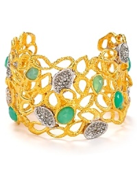 This striking cuff from Alexis Bittar is all about edgy elegance. It features a series of chalcedony stone and crystal accents inset in glistening gold-plated metal. This striking cuff from Alexis Bittar is all about edgy elegance. It features a series of chalcedony stone and crystal accents inset in glistening gold-plated metal.