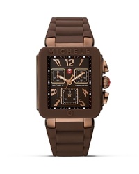 A decadent piece of arm-candy, this Michele Jelly Bean watch works a rich vibe, crafted of enamel and finished with tony, rose gold accents and a sporty silicone strap. A decadent piece of arm-candy, this Michele Jelly Bean watch works a rich vibe, crafted of enamel and finished with tony, rose gold accents and a sporty silicone strap.
