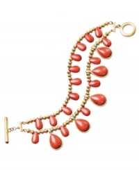 Infuse your style with tropical hues. Lauren by Ralph Lauren's vibrant two-row bracelet features teardop-shaped reconstituted coral beads set in gold tone mixed metal. Approximate length: 7-1/2 inches. Infuse your style with tropical hues. Lauren by Ralph Lauren's vibrant two-row bracelet features teardop-shaped reconstituted coral beads set in gold tone mixed metal. Approximate length: 7-1/2 inches.
