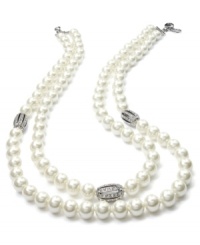 Endless elegance. Lauren Ralph Lauren's double-strand glass pearl necklace features metal accents with pave crystals. Crafted in silver tone mixed metal. Approximate length: 19 inches. Endless elegance. Lauren Ralph Lauren's double-strand glass pearl necklace features metal accents with pave crystals. Crafted in silver tone mixed metal. Approximate length: 19 inches.