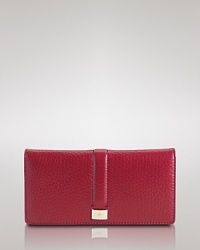A versatile everyday style that's purse-perfect, Cole Haan's slim leather wallet boasts a clean design and pockets for the essentials. A versatile everyday style that's purse-perfect, Cole Haan's slim leather wallet boasts a clean design and pockets for the essentials.