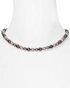 In a cool hue, Majorica's gray pearl strand is dark, stormy and seriously chic. Slip it on as an alternative to classic whites.