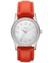 A casual, shimmering creation from DKNY for those days when a burst of color is absolutely necessary. Watch crafted of red leather strap and oval stainless steel case. Bezel embellished with 48 clear crystal accents. White dial features silver tone three hands, applied stick indices, numerals at three, six, nine and twelve o'clock, minute track and logo at twelve o'clock. Quartz movement. Water resistant to 50 meters. Two-year warranty. A casual, shimmering creation from DKNY for those days when a burst of color is absolutely necessary. Watch crafted of red leather strap and oval stainless steel case. Bezel embellished with 48 clear crystal accents. White dial features silver tone three hands, applied stick indices, numerals at three, six, nine and twelve o'clock, minute track and logo at twelve o'clock. Quartz movement. Water resistant to 50 meters. Two-year warranty.