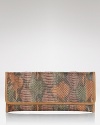 Take the textured leather trend out for the evening with this snakeskin clutch from Carlos Falchi. Ideally sized for the essentials, it's a must for the nocturnal creature.