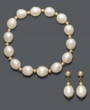 The perfect polished pair. This elegant jewelry set effortlessly perfects any look. Crafted in 14k gold with beaded accents and cultured freshwater pearls (8-9 mm). Approximate bracelet length: 7-1/4 inches. Approximate earring drop: 1 inch.