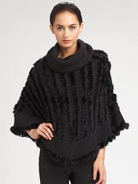 A sophisticated style with luxurious dyed rabbit fur accenting a warm knitted design. Oversized turtleneckCurved hemAbout 35 from shoulder to hem70% acrylic/30% woolSpecialist dry cleanImportedFur origin: China A sophisticated style with luxurious dyed rabbit fur accenting a warm knitted design. Oversized turtleneckCurved hemAbout 35 from shoulder to hem70% acrylic/30% woolSpecialist dry cleanImportedFur origin: China