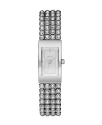 Tell time with rows of shine, thanks to this brilliant DKNY watch. Bracelet crafted from four rows of crystal set in stainless steel and rectangular case. Silvertone dial features silvertone hands, stick indices and logo. Quartz movement. Water resistant to 30 meters. Two-year limited warranty.