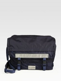 An exceptionally cool messenger is the ideal every day carryall, crafted in sturdy nylon for a sporty look.Flap, buckle closureAdjustable shoulder strapExterior,interior pocketsFully linedNylon16W x 15H x 4DImported An exceptionally cool messenger is the ideal every day carryall, crafted in sturdy nylon for a sporty look.Flap, buckle closureAdjustable shoulder strapExterior,interior pocketsFully linedNylon16W x 15H x 4DImported