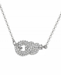 With unique style and grace, Swarovski's Nathalie necklace is sure to make an elegant statement! Necklace features an intricate, knotted design crafted in silver tone mixed metal with sparkling, round-cut crystals. Approximate length: 15 inches. Approximate drop: 1 inch. With unique style and grace, Swarovski's Nathalie necklace is sure to make an elegant statement! Necklace features an intricate, knotted design crafted in silver tone mixed metal with sparkling, round-cut crystals. Approximate length: 15 inches. Approximate drop: 1 inch.