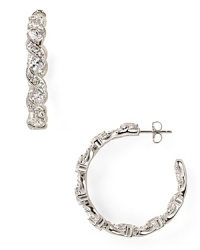 Make statement sparkle your new signature with these rhodium plated hoops from Lora Paolo. Boasting delicate detailing, this pair perfects evening elegance. Make statement sparkle your new signature with these rhodium plated hoops from Lora Paolo. Boasting delicate detailing, this pair perfects evening elegance.